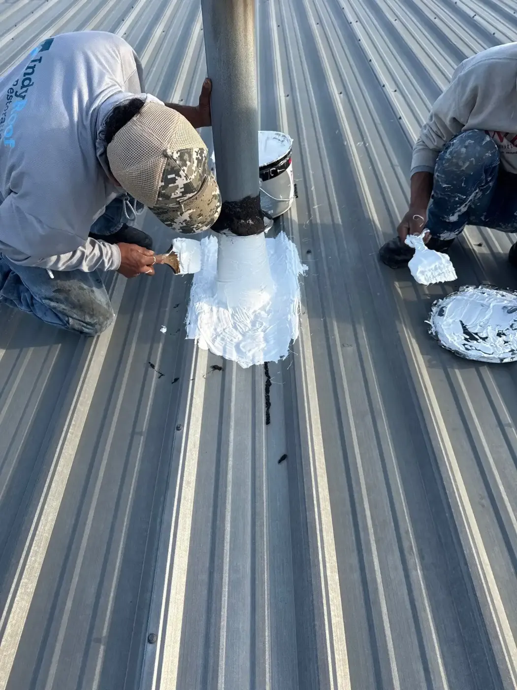 Tarping and dry-in on a Pheasants Run commercial roof